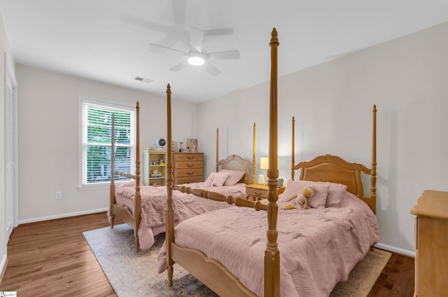 4 Barley Mill Dr, Greer, SC 29651 - bedroom with baseboards, a ceiling fan, wood finished floors, and visible vents