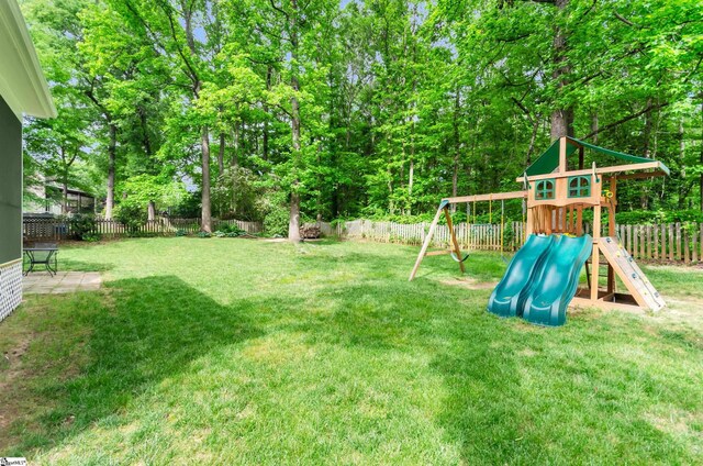 4 Barley Mill Dr, Greer, SC 29651 - view of yard with a fenced backyard and a playground