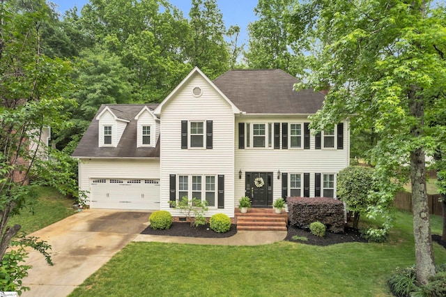 4 Barley Mill Dr, Greer, SC 29651 - colonial home featuring a garage, a front lawn, fence, roof with shingles, and driveway