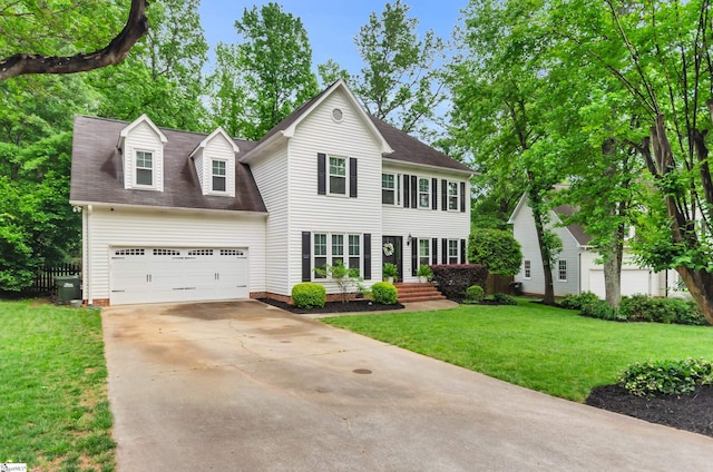 4 Barley Mill Dr, Greer, SC 29651 - colonial-style house featuring a garage, a shingled roof, driveway, and a front yard