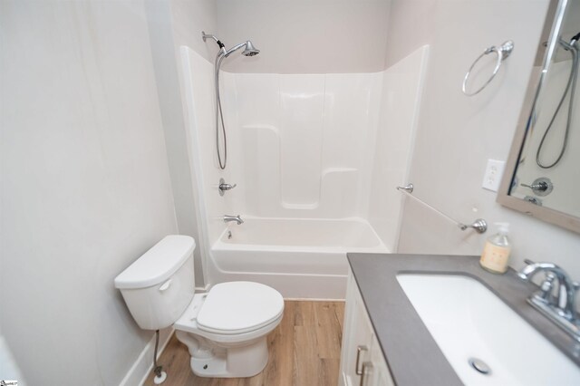 14 Damson St, Spartanburg, SC 29303 - bathroom with bathtub / shower combination, vanity, toilet, baseboards, and wood finished floors