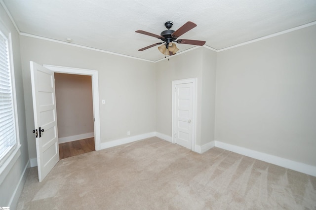 14 Damson St, Spartanburg, SC 29303 - spare room with ceiling fan, ornamental molding, baseboards, and carpet