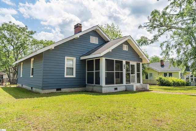 14 Damson St, Spartanburg, SC 29303 - rear view of house featuring a yard, a chimney, a sunroom, and crawl space