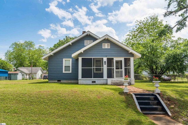 14 Damson St, Spartanburg, SC 29303 - rear view of house featuring fence, a yard, a sunroom, and crawl space