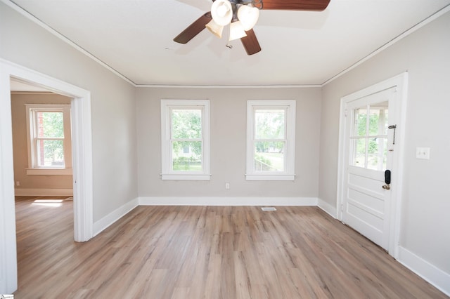 14 Damson St, Spartanburg, SC 29303 - unfurnished room featuring a healthy amount of sunlight, baseboards, ornamental molding, and light wood-type flooring