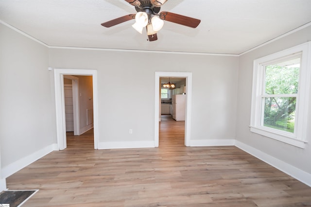 14 Damson St, Spartanburg, SC 29303 - unfurnished room featuring crown molding, light wood-style flooring, and baseboards