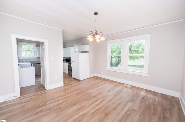 14 Damson St, Spartanburg, SC 29303 - unfurnished dining area with a chandelier, washer / clothes dryer, baseboards, light wood-type flooring, and visible vents