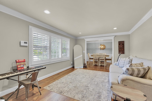 living area featuring recessed lighting, ornamental molding, and wood finished floors