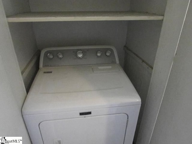 laundry room featuring laundry area and washer / clothes dryer