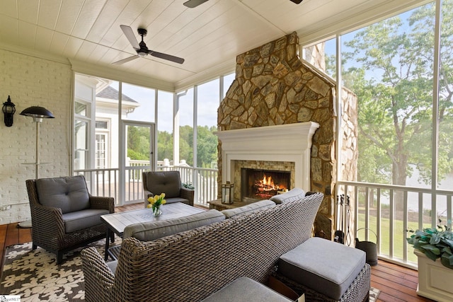312 Stonebrook Farm Way, Greenville, SC 29615 - sunroom / solarium featuring ornamental molding, an outdoor living space with a fireplace, ceiling fan, and hardwood / wood-style floors