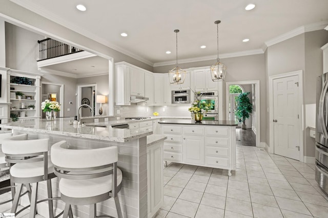 312 Stonebrook Farm Way, Greenville, SC 29615 - kitchen featuring a sink, appliances with stainless steel finishes, white cabinets, and backsplash