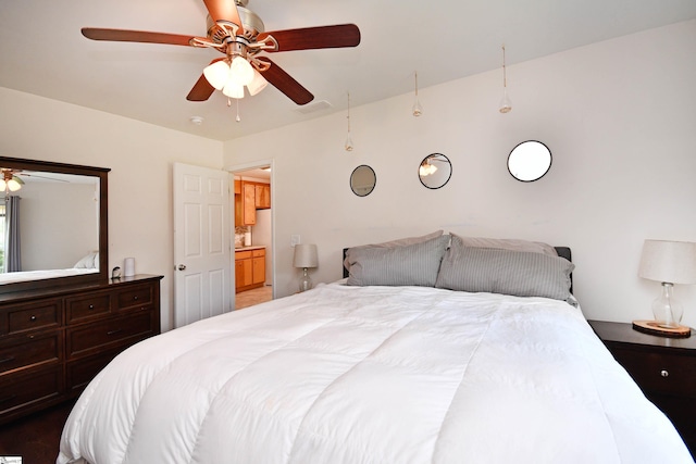 bedroom featuring a ceiling fan and visible vents