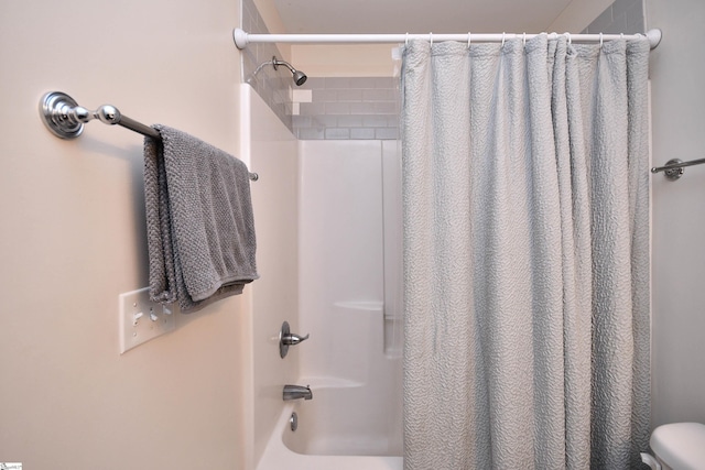 full bathroom with shower / tub combo