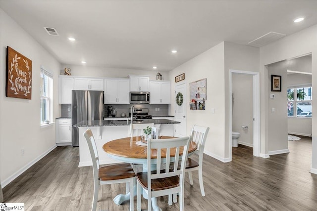 75 Oak Edge Ln, Greer, SC 29651 - dining area featuring baseboards, recessed lighting, wood finished floors, and visible vents