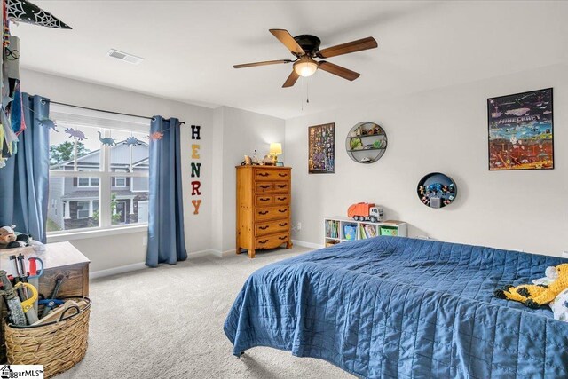 75 Oak Edge Ln, Greer, SC 29651 - carpeted bedroom with baseboards, a ceiling fan, and visible vents