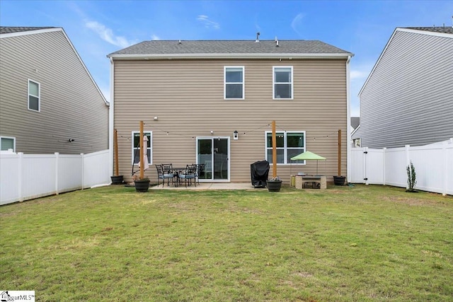 75 Oak Edge Ln, Greer, SC 29651 - rear view of property featuring a lawn, a patio, and a fenced backyard