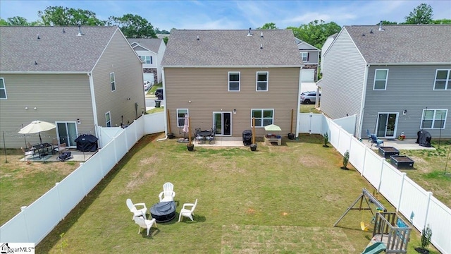 75 Oak Edge Ln, Greer, SC 29651 - back of property with a lawn, an outdoor fire pit, and a patio area