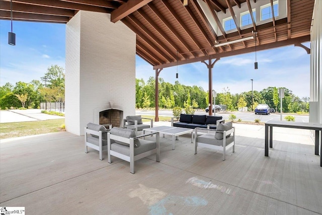 75 Oak Edge Ln, Greer, SC 29651 - view of patio / terrace featuring an outdoor living space with a fireplace
