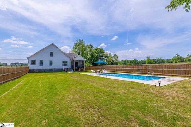 view of pool with a fenced backyard, a fenced in pool, and a lawn