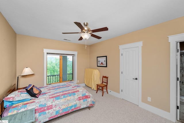 carpeted bedroom featuring access to outside, ceiling fan, visible vents, and baseboards