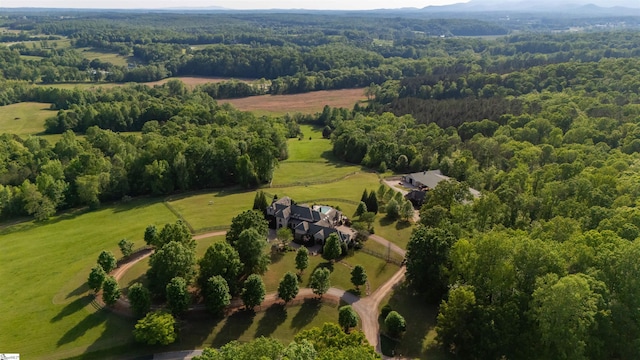 aerial view with a view of trees and a rural view