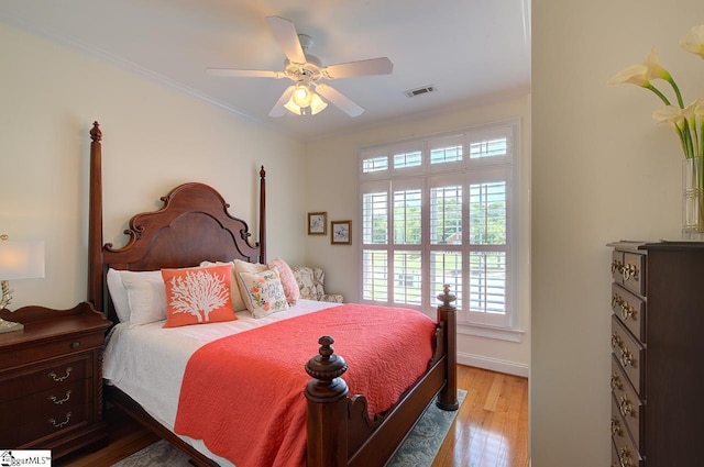 132 Hartsfield Dr, Easley, SC 29642 - bedroom with visible vents, a ceiling fan, wood finished floors, and multiple windows