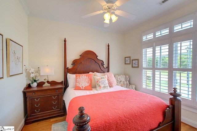 132 Hartsfield Dr, Easley, SC 29642 - bedroom featuring visible vents, ornamental molding, light wood-style floors, baseboards, and ceiling fan