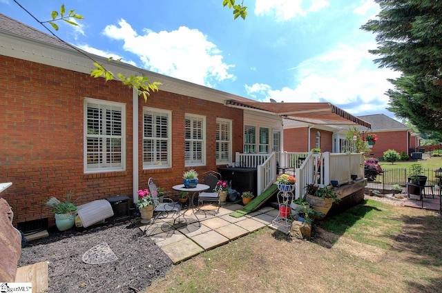 132 Hartsfield Dr, Easley, SC 29642 - rear view of property with fence, a patio, and brick siding