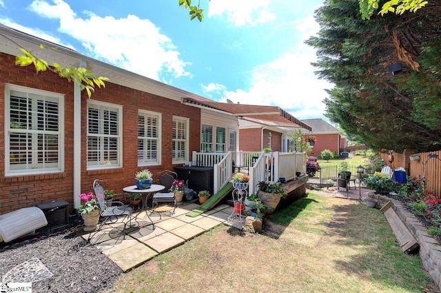 132 Hartsfield Dr, Easley, SC 29642 - rear view of house with brick siding, fence, and a patio area