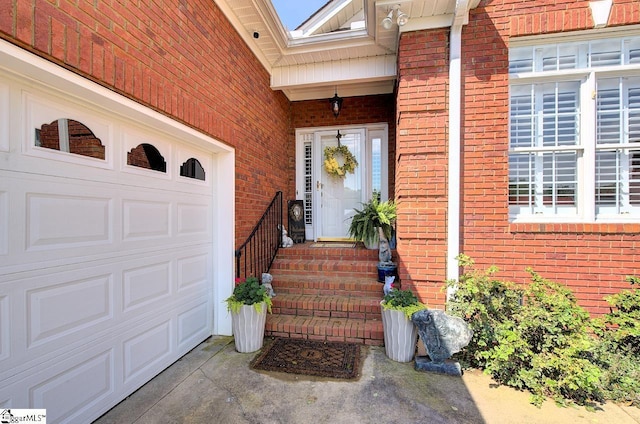 132 Hartsfield Dr, Easley, SC 29642 - property entrance with brick siding, driveway, and a garage
