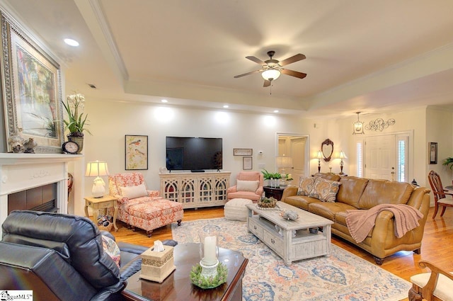 132 Hartsfield Dr, Easley, SC 29642 - living area featuring crown molding, a tray ceiling, ceiling fan, and light wood finished floors