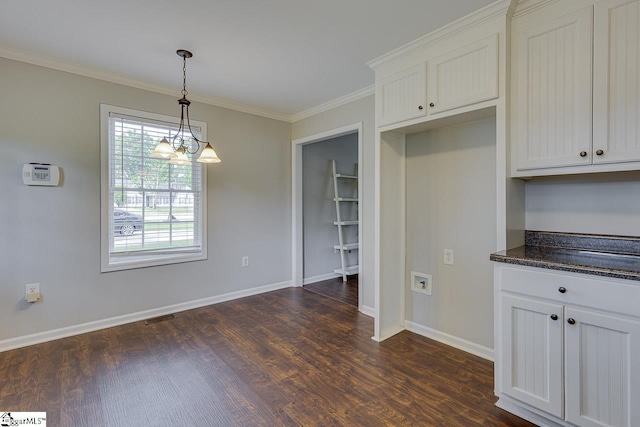 101 Merganser Ct, Liberty, SC 29657 - unfurnished dining area with ornamental molding, dark wood-style flooring, and visible vents