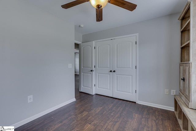 101 Merganser Ct, Liberty, SC 29657 - unfurnished bedroom with dark wood-type flooring, a ceiling fan, baseboards, and a closet