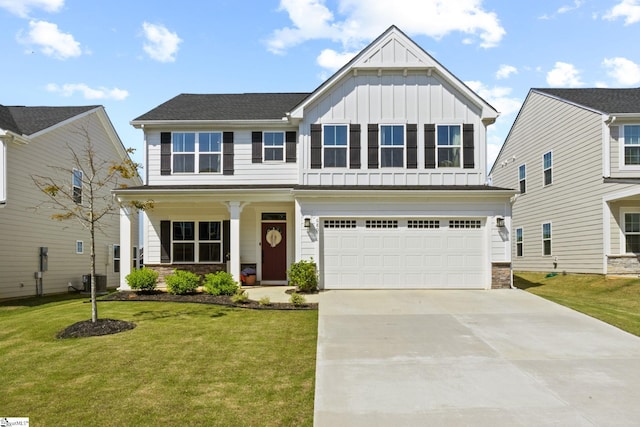 view of front of property featuring an attached garage, board and batten siding, a front yard, concrete driveway, and covered porch