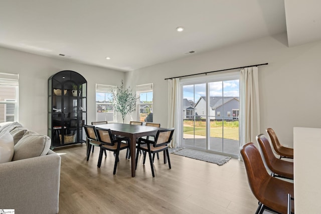 dining room with visible vents, recessed lighting, and light wood-type flooring