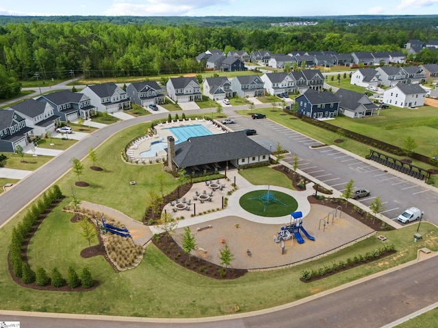 birds eye view of property with a residential view