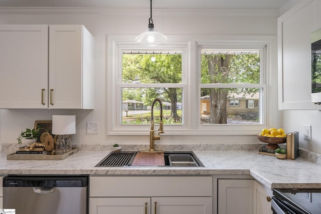 kitchen with white cabinets, a sink, and dishwasher
