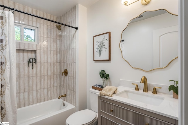 bathroom featuring vanity, shower / tub combo with curtain, and toilet
