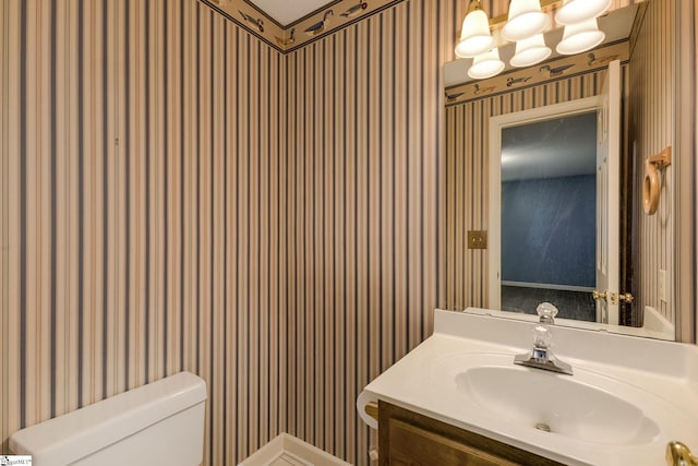 5 Bellfort Ct, Taylors, SC 29687 - half bath featuring vanity, toilet, and wallpapered walls