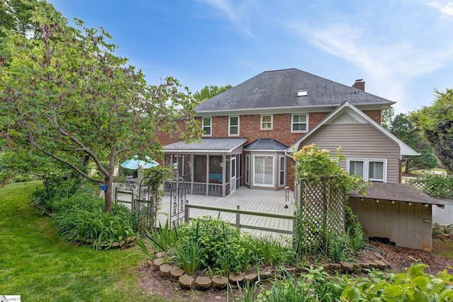 5 Bellfort Ct, Taylors, SC 29687 - back of house with a sunroom, a shingled roof, a wooden deck, and a chimney