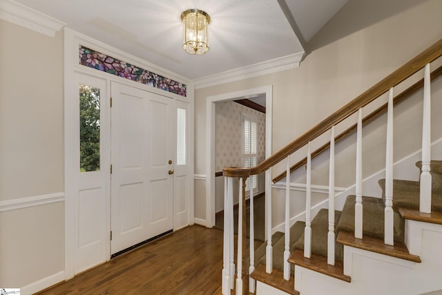 5 Bellfort Ct, Taylors, SC 29687 - foyer entrance featuring an inviting chandelier, ornamental molding, stairs, and wood finished floors