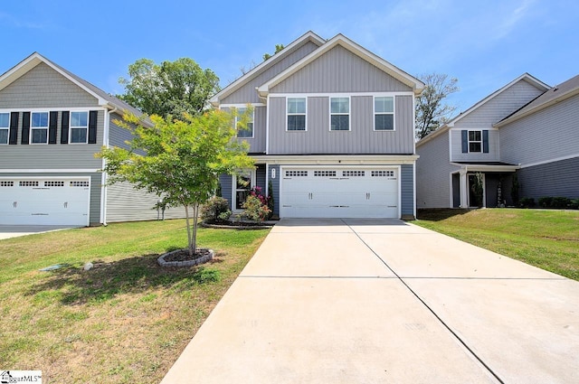 view of front of property with an attached garage, a front lawn, board and batten siding, and concrete driveway