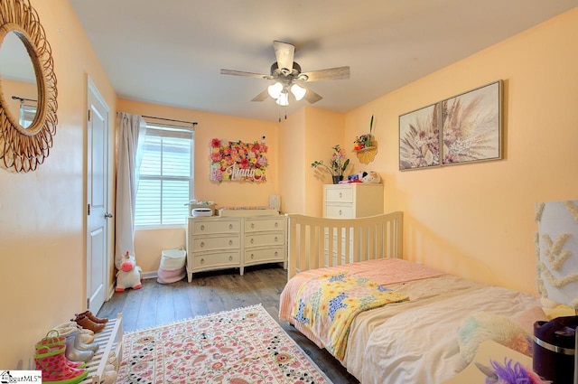 bedroom featuring ceiling fan and wood finished floors