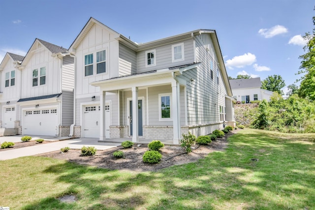 modern inspired farmhouse with covered porch, board and batten siding, a garage, a front lawn, and concrete driveway