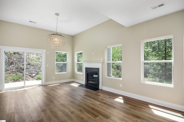 unfurnished living room with baseboards, dark wood finished floors, and visible vents