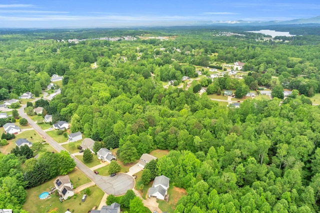 aerial view featuring a forest view