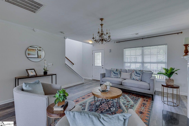 106 Hickory Valley Way, Taylors, SC 29687 - living area with a notable chandelier, visible vents, plenty of natural light, and wood finished floors