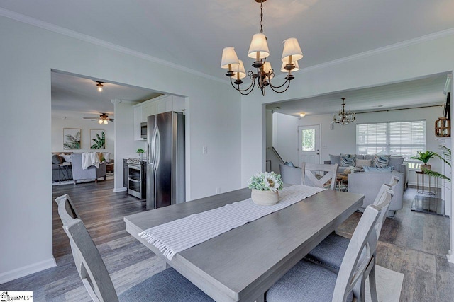 106 Hickory Valley Way, Taylors, SC 29687 - dining area with crown molding, baseboards, ceiling fan with notable chandelier, and wood finished floors