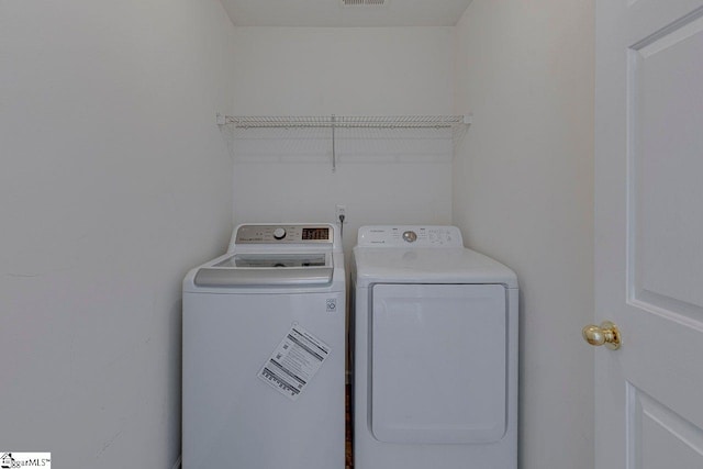 106 Hickory Valley Way, Taylors, SC 29687 - laundry room with laundry area, visible vents, and washing machine and dryer