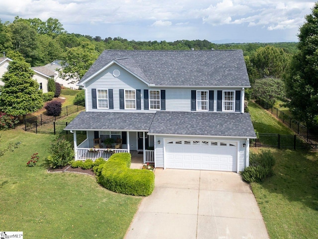 106 Hickory Valley Way, Taylors, SC 29687 - traditional-style home featuring covered porch, fence, concrete driveway, and a front yard